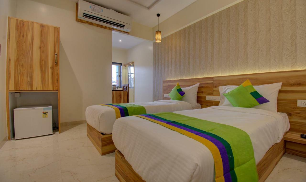 סוראט Hotel Amisha International מראה חיצוני תמונה