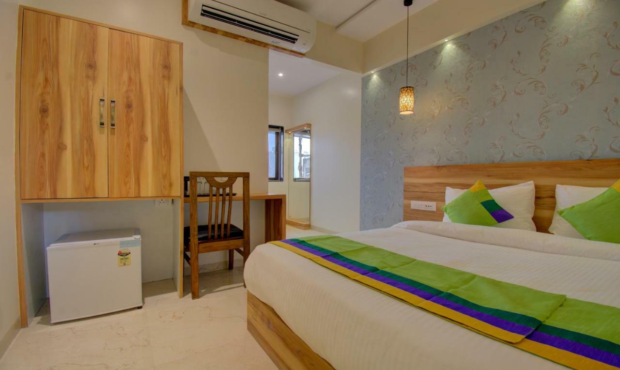 סוראט Hotel Amisha International מראה חיצוני תמונה