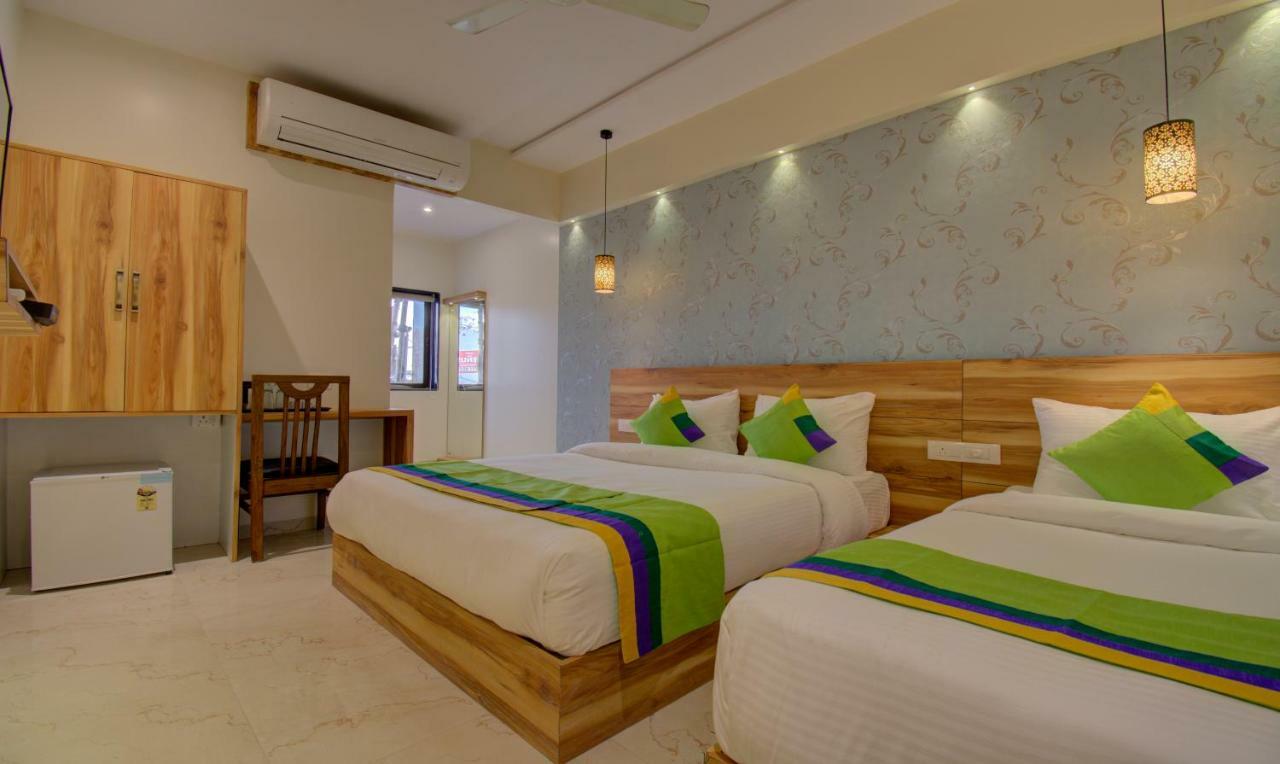 סוראט Hotel Amisha International מראה חיצוני תמונה