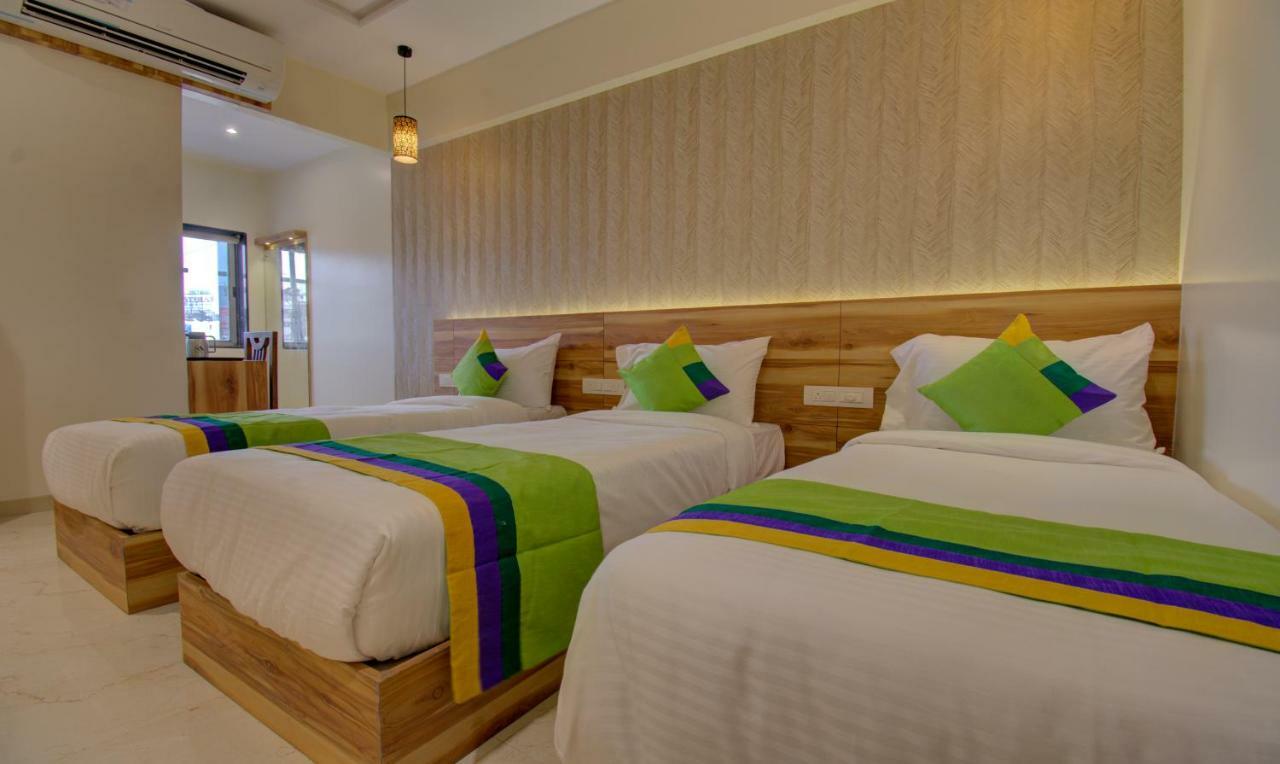 סוראט Hotel Amisha International מראה חיצוני תמונה