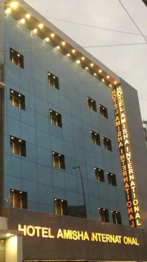 סוראט Hotel Amisha International מראה חיצוני תמונה